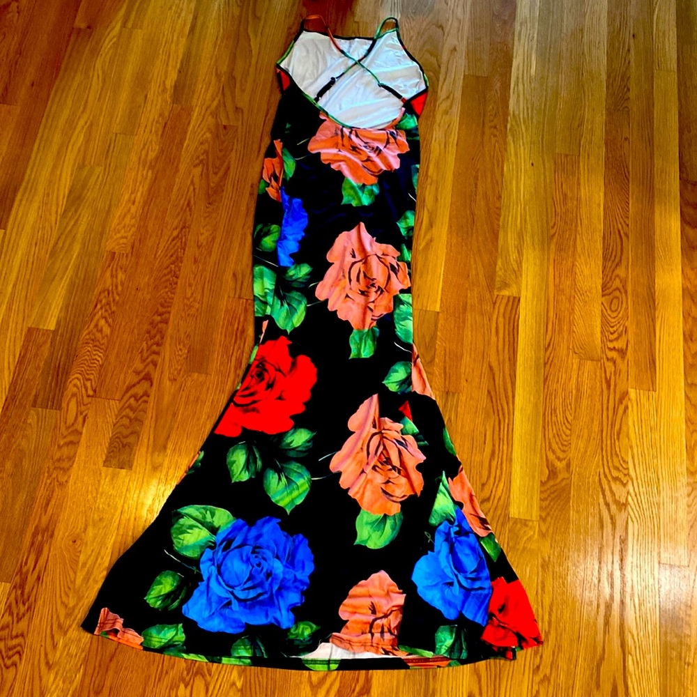 Floor length backless dress with floral pattern and light fabric for summer